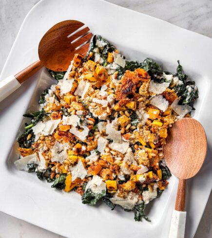 Kale Caesar Salad With Roasted Delicata Squash, Pinenuts, and Parmesan