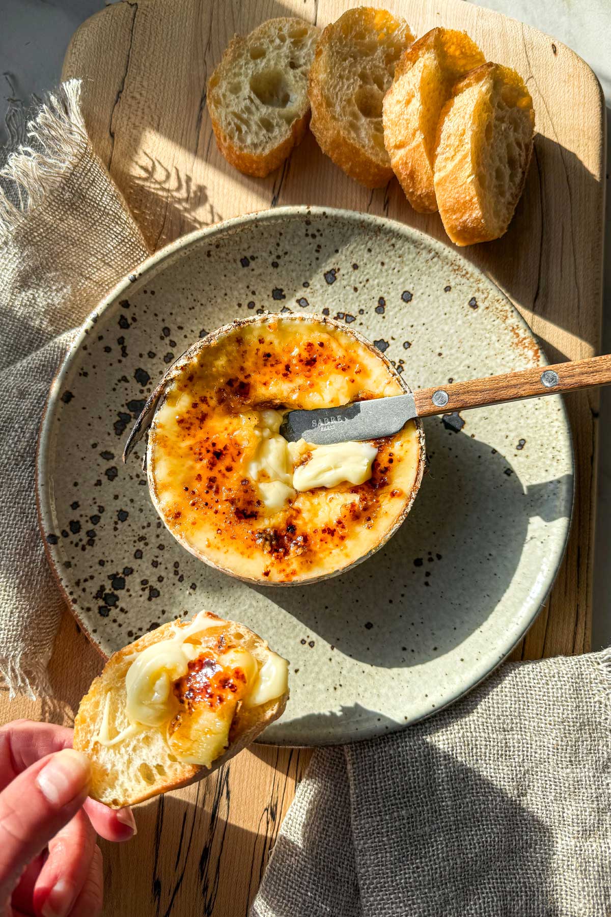 Maple brûlée Harbison recipe with molten Vermont cheese and caramelized maple sugar crust