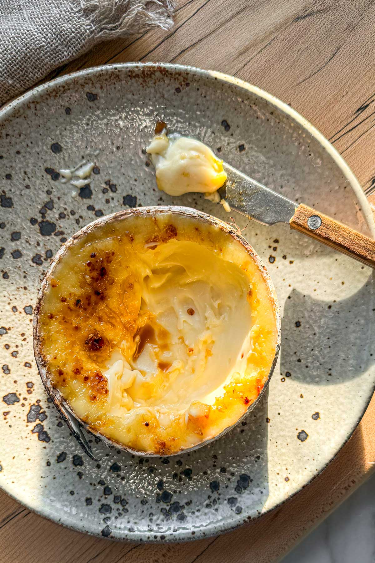 Maple brûlée Harbison recipe with molten Vermont cheese and caramelized maple sugar crust